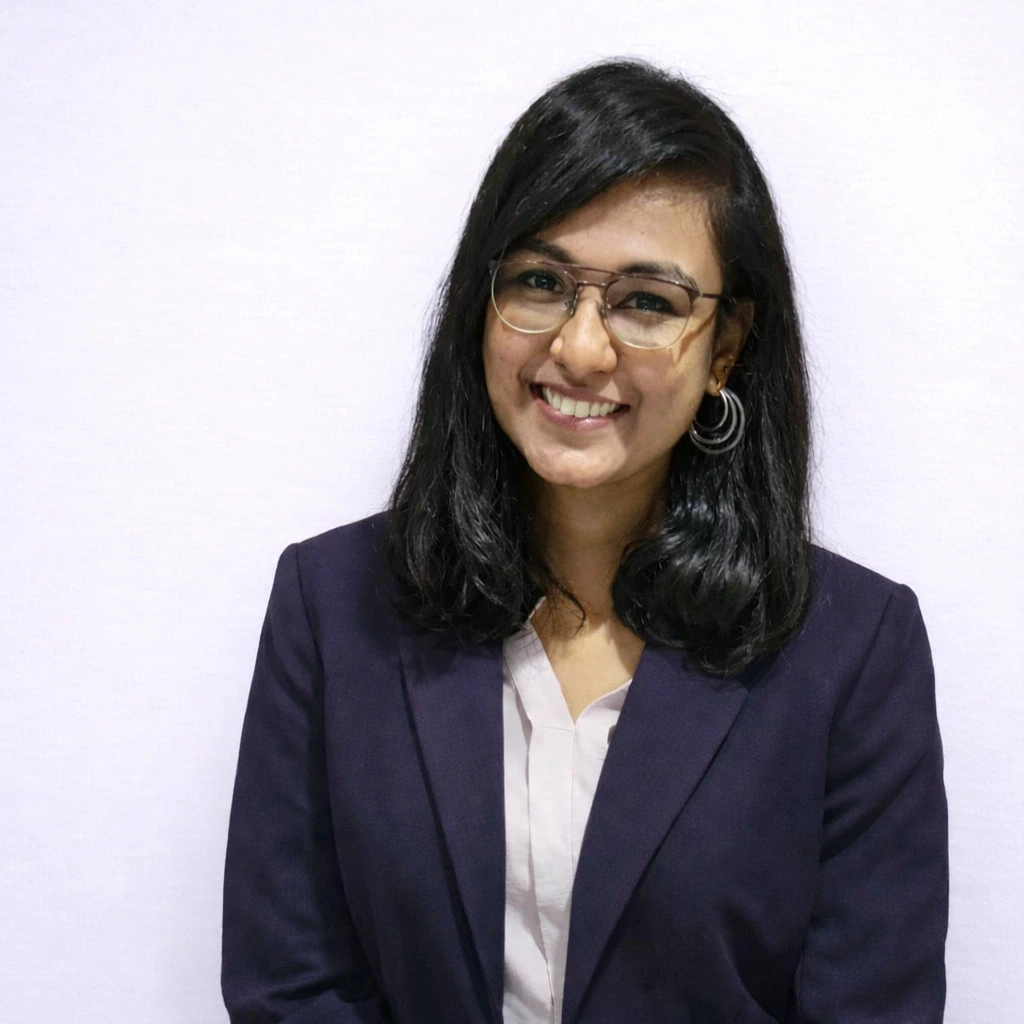 Professional portrait of a counselling psychologist client smiling, representing trust and client satisfaction